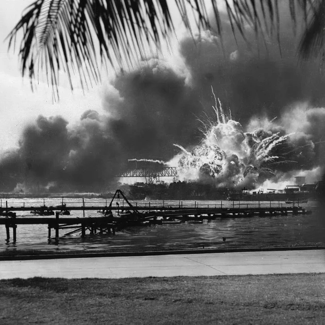 Eighty-four years ago today, Japanese forces attacked a Pearl Harbor, a naval installation on the Hawaiian island of Oahu, killing over 2400 Americans, and destroying many American vessels. In 1994, Congress officially designated December 7 as a day of remembrance to commemorate the courage and sacrifice demonstrated that took place by both service members and civilians alike.

Unknown to him at the time, Chaplain Howell Forgy became the central figure in one of the most widely memorable stories that would be recalled about that day. Because they had no power on the ship, sailors aboard the USS New Orleans had to form a line and manually pass ammunition from below decks to the guns above.  

As a chaplain, Forgy could not actively participate in combat, but he offered much-needed support by running up and down the line and patting the men on the back saying “Praise the Lord and pass the ammunition!” a phrase which became the title of one of the most popular songs to come out of the era of the war era.

Here at the Chaplains Museum, we believe the best way to commemorate this kind of service and sacrifice is through telling their stories. Visit the Museum to learn more about Forgy and other heroic U.S. military chaplains!

Image: Chaplain Howell Forgy

Image: Explosions rocking the U.S. naval base at Pearl Harbor, Hawaii, during the Japanese surprise air attack on December 7, 1941. Brittanica.

Help the Chaplains Museum expand our collection and add new exhibits! Look for the "Donate" section at the link in our bio. 

#pearlharbor #chaplainsmuseum #chaplains #faithinservice #neverforget