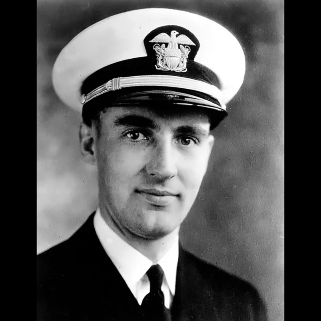 Aboard USS Oklahoma on December 7, 1941, Chaplain Aloysius H. Schmitt had just finished hearing confessions after 7 a.m. Mass when the first torpedo struck. Within 10 minutes, the battleship rolled over, trapping hundreds below in darkness and rising water. In one flooded compartment, a 24x26-inch porthole became the only escape.

Chaplain Schmitt immediately began pushing men through, one by one, into the arms of rescuers topside. Among them was Bob Burns, the altar server from that morning’s mass. Burns later recalled Chaplain Smitt’s role in rescuing him “He recognized my voice and said, ‘Over here!’ Two men were pulling—I was pushing. He got me out.”

Schmitt saved 12 men that day. He was halfway out with rescuers trying to pull him through when cries were heard behind him. Chaplain Schmitt immediately went back to help those still trapped inside. His last words as he went down were: “I’m going to check on some other men and bless them.”

Chaplain Schmitt was among 429 who perished aboard Oklahoma and the first chaplain to die in World War II. Posthumously, he was awarded the Purple Heart, Navy and Marine Corps Medal, and Silver Star. In 2016, Chaplain Schmitt’s remains were identified in Honolulu, and his remains arrived home in Iowa on the 75th anniversary of the attack.

Stay tuned to learn more about the heroic service of chaplains who risked their lives to save others during the attack on Pearl Harbor.

Image: Chaplain Aloysius Schmitt

Help the Chaplains Museum expand our collection and add new exhibits! Look for the “Donate” section at the link in our bio.

#chaplainsmuseum #chaplain #militarychaplain #libertyuniversity #navy #pearlharbor #worldwar2 #pearlharborheroes